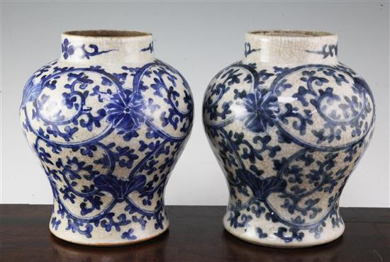 A pair of Chinese blue and white crackle glaze baluster vases, late 19th / early 20th century, 22cm